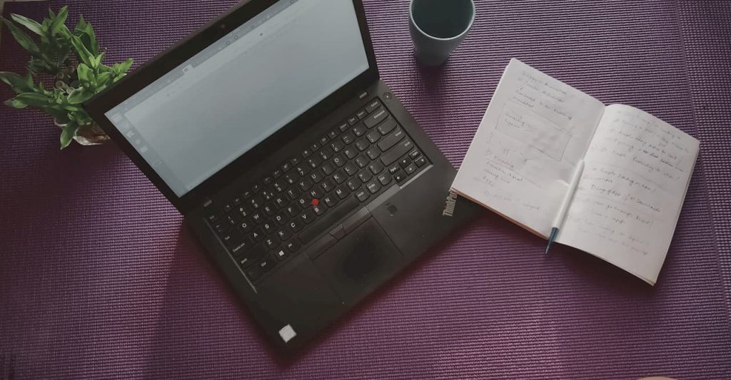Wordpress, computer with notebook